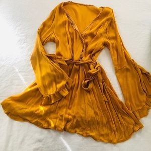 Mustard colored dress.